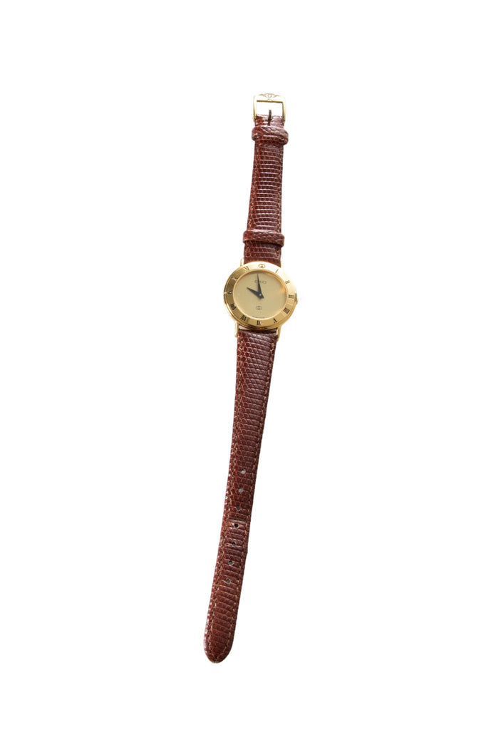 Gucci Gold toned Watch with Leather Band - irvrsbl