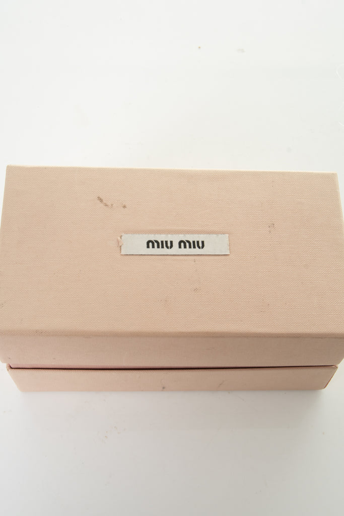 Miu Miu Pink Wraparound Sunglasses - irvrsbl